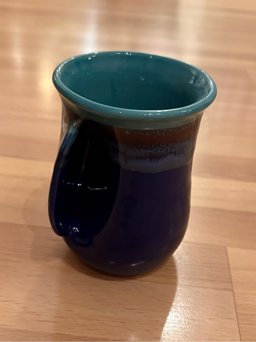 Handmade Blue Ceramic Mug with Teal Interior left handed mug